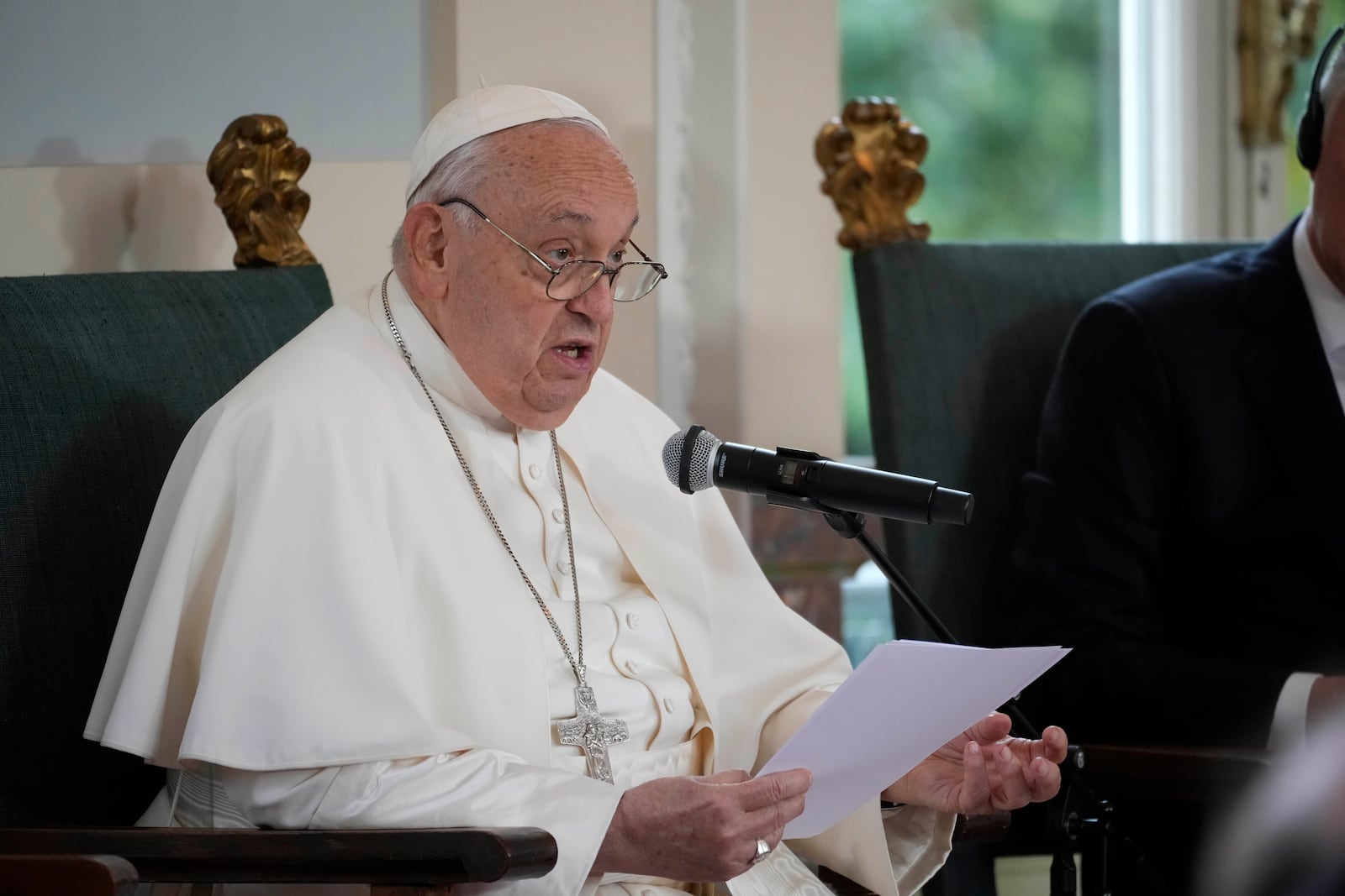 Pope Francis delivers his message during a meeting with the authorities and the civil society in the Grande Galerie of the Castle of Laeken, Brussels, Friday, Sept. 27, 2024. (AP Photo/Andrew Medichini)