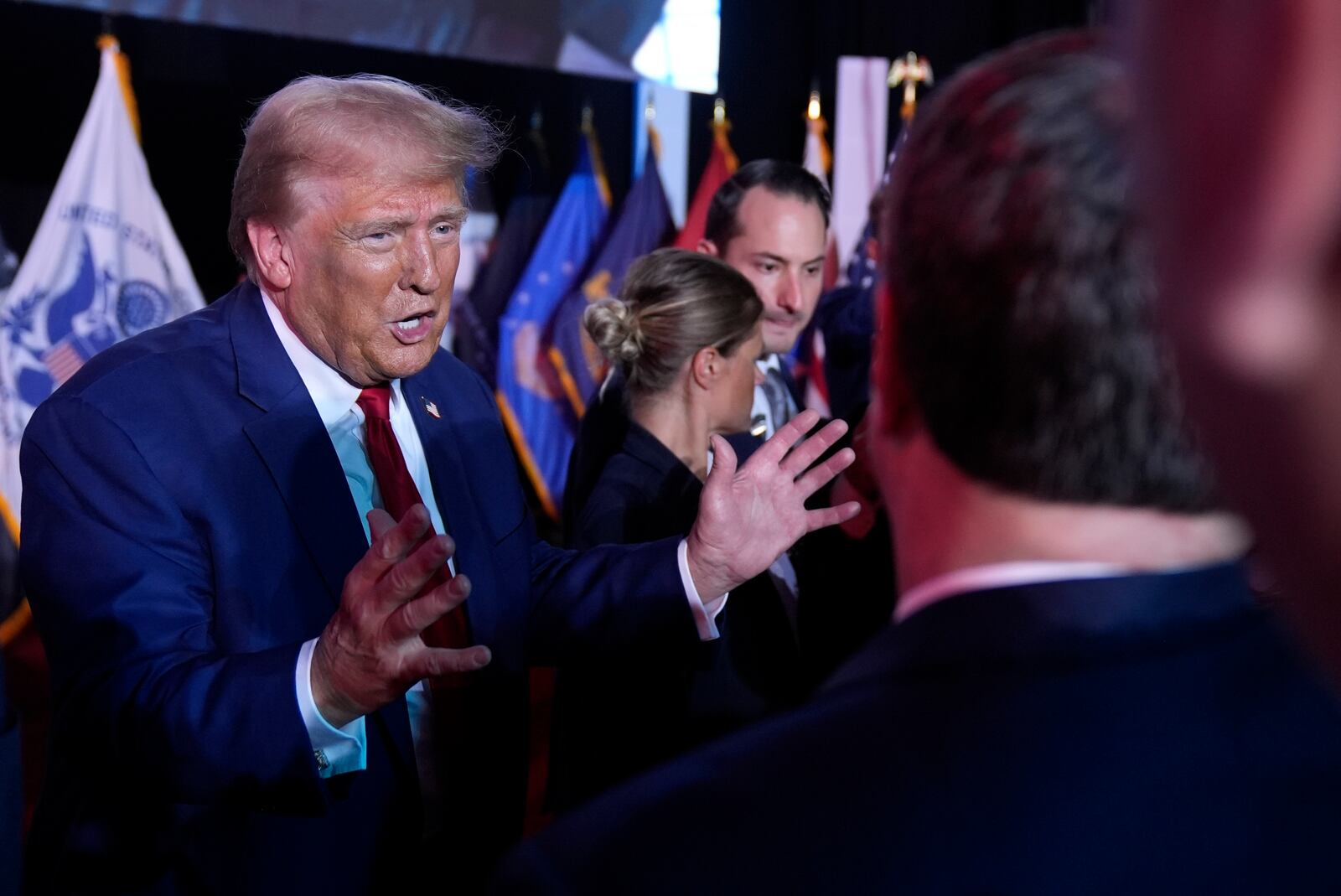 Republican presidential nominee former President Donald Trump talks with supporters at a campaign town hall Friday, Oct. 4, 2024, in Fayetteville, N.C. (AP Photo/Evan Vucci)