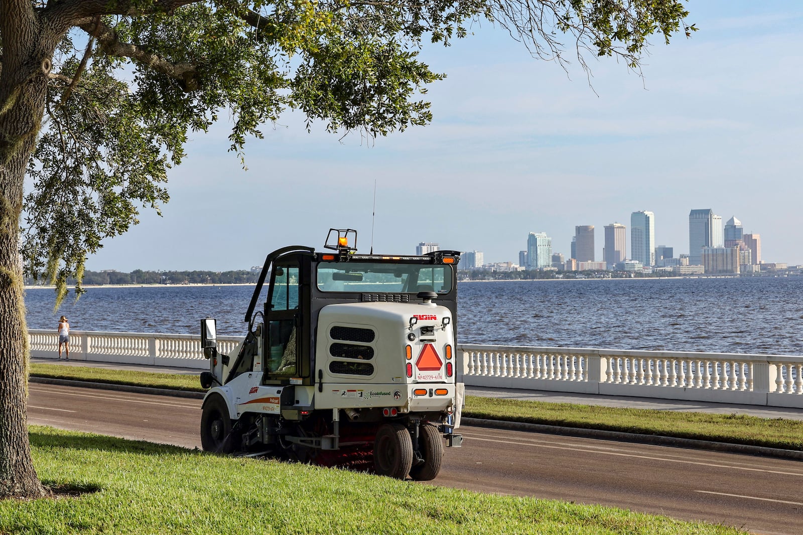 Cleanup from flooding by Hurricane Helene continues on Bayshore Boulevard on Saturday, Sept. 28, 2024, in Tampa, Fla. (AP Photo/Mike Carlson)