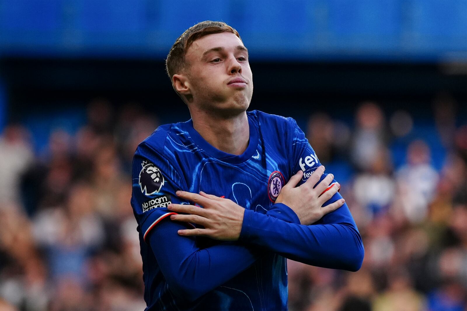 Chelsea's Cole Palmer celebrates after scoring his side's second goal during the English Premier League soccer match between Chelsea and Newcastle at Stamford Bridge in London, Sunday, Oct. 27, 2024. (AP Photo/Dave Shopland)