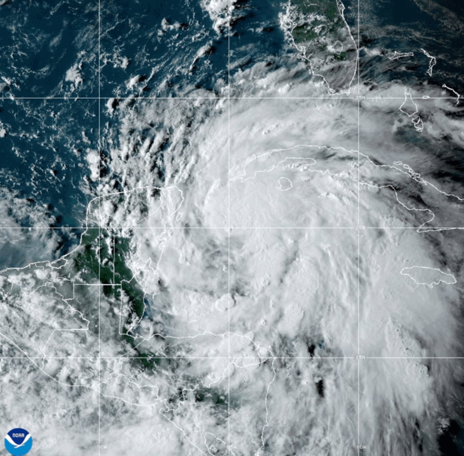 This National Oceanic and Atmospheric Administration satellite image taken at 6:10pm ET shows Tropical Storm Helene off the Gulf Coast of Florida near Mexico and Cuba on Tuesday, Sept. 24, 2024. (NOAA via AP)