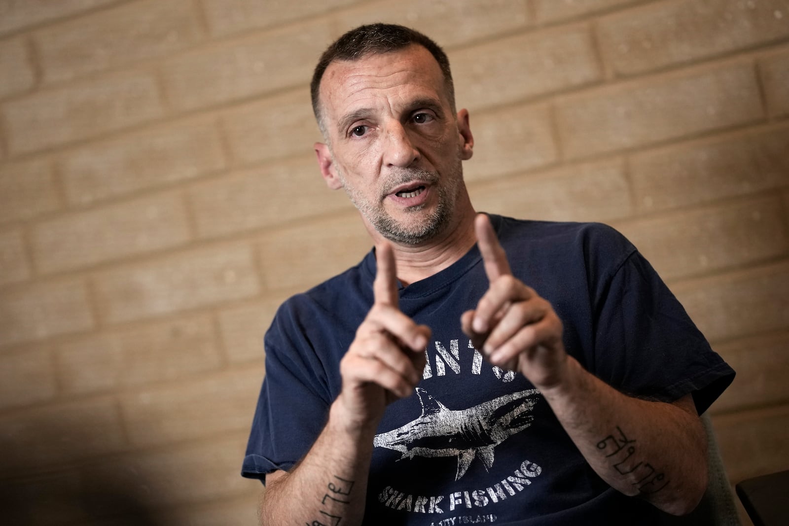 Mathieu Kassovitz speaks during an interview with Associated Press, in Tremblay-en-France, Tuesday, Sept. 17, 2024. (AP Photo/Christophe Ena)