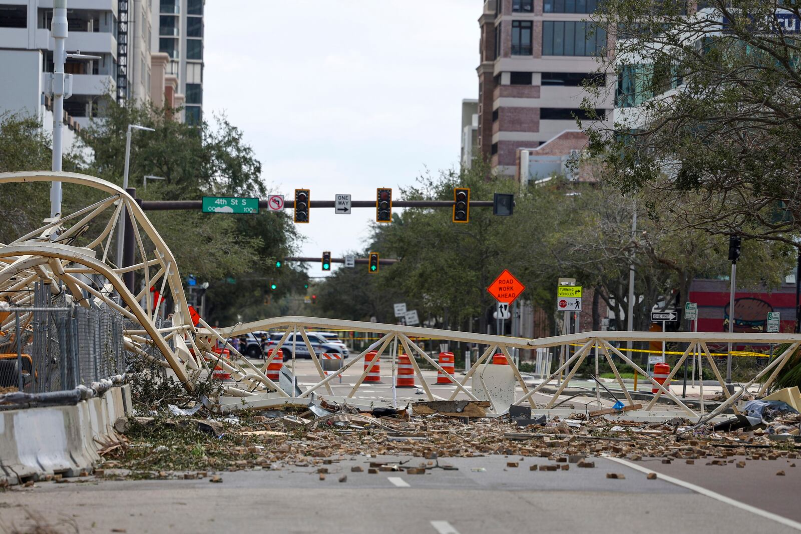 A high rise construction crane broke apart and crashed into the building across the street during Hurricane Milton on Thursday, Oct. 10, 2024, in St. Petersburg, Fla. (AP Photo/Mike Carlson)