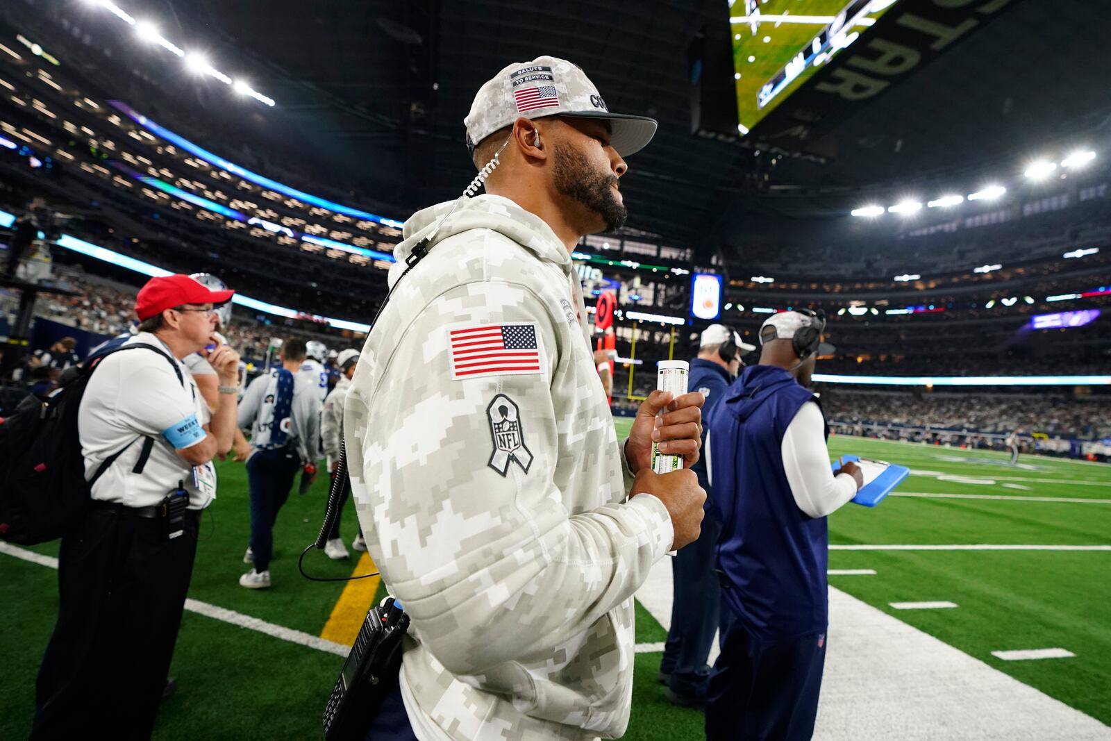 Dallas Cowboys' Dak Prescott watches play against the Philadelphia Eagles in the second half of an NFL football game in Arlington, Texas, Sunday, Nov. 10, 2024. (AP Photo/Jeffrey McWhorter)