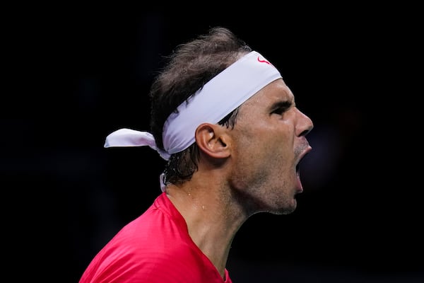 Spain's tennis player Rafael Nadal reacts during a Davis Cup quarterfinal match against Netherlands' Botic Van De Zandschulp at Martin Carpena Sports Hall in Malaga, southern Spain, on Tuesday, Nov. 19, 2024. (AP Photo/Manu Fernandez)