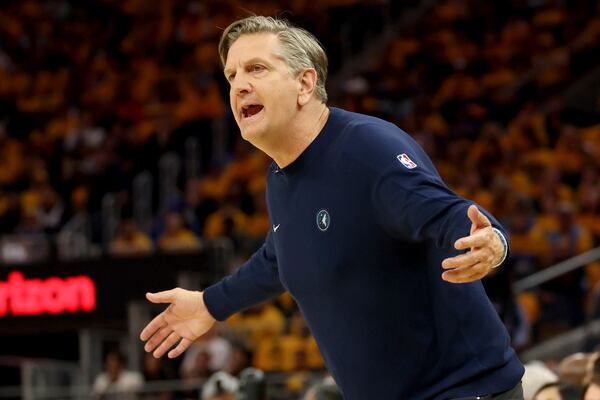 Minnesota Timberwolves head coach Chris Finch gestures to his team during the first half of Game 4 in the Western Conference semifinals of the NBA basketball playoffs against the Golden State Warriors, Monday, May 12, 2025, in San Francisco. (AP Photo/Jed Jacobsohn)