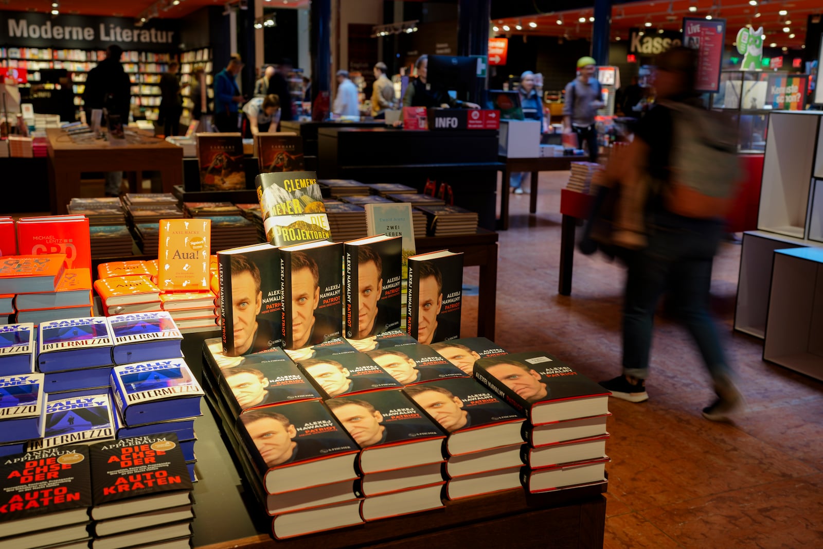 Copies of the late Russian opposition leader Alexei Navalny's memoir entitled 'Patriot' are put display on the first day of sale in a bookshop in Berlin, Germany, Tuesday, Oct. 22, 2024. (AP Photo/Markus Schreiber)