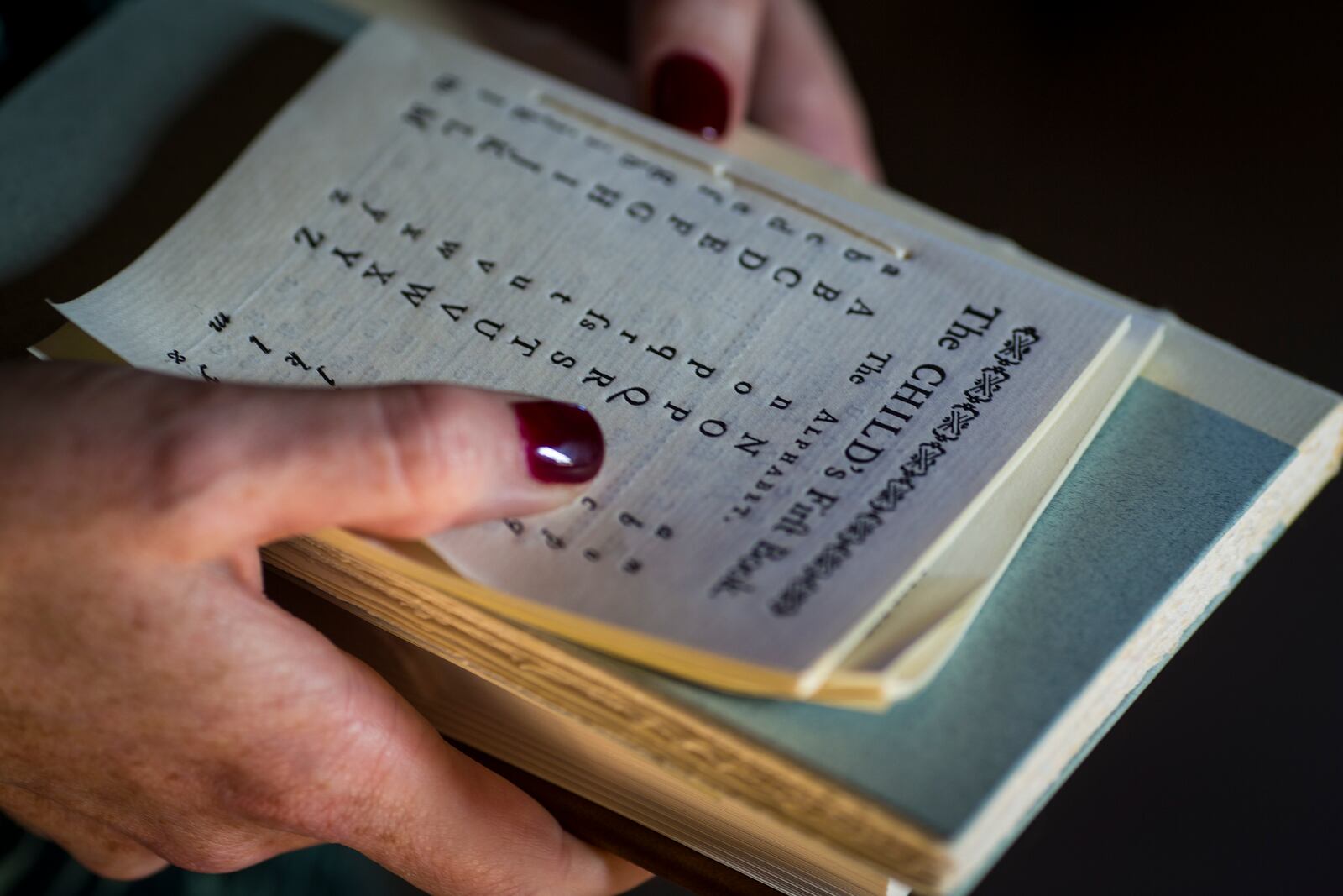 Replicas of the books that students would have used at the Williamsburg Bray School on Wednesday, Oct 30, 2024 in Williamsburg, Va. (AP Photo/John C. Clark)