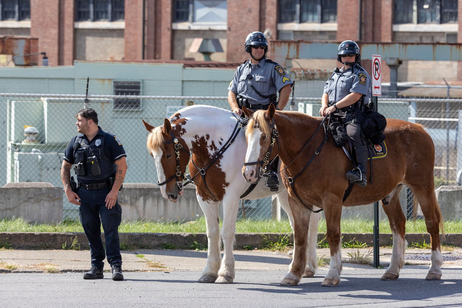 Pennsylvania State Police provide security with horses before President of Ukraine Volodymyr Zelenskyy's motorcade arrives at the Scranton Army Ammunition Plant in Scranton on Sunday, Sept. 22, 2024. (AP Photo/Laurence Kesterson)