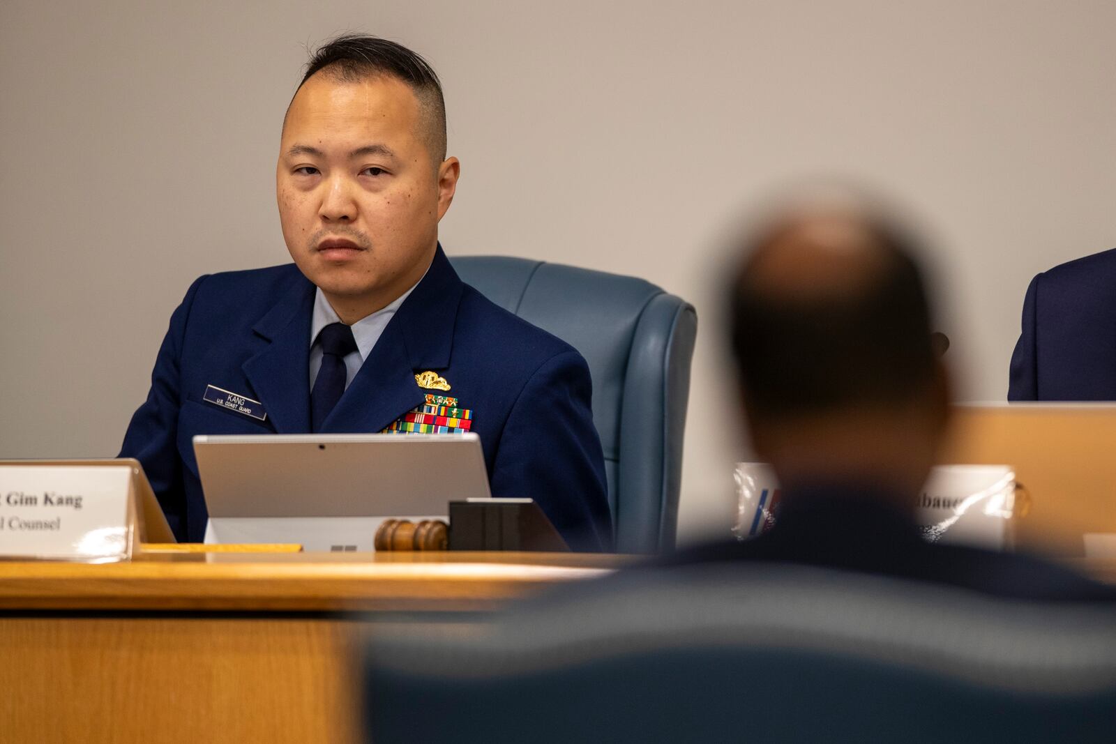 Gim Kang, special counsel for the Coast Guard's Titan Submersible Marine Board of Investigation, listens during the formal hearing inside the Charleston County Council Chambers, Monday, Sept. 23, 2024, in North Charleston, S.C. (Laura Bilson/The Post And Courier via AP, Pool)