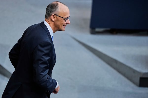 Friedrich Merz waits for the beginning of a session where he is expected to be elected new chancellor in the German federal parliament, Bundestag, at the Reichstag building in Berlin, Tuesday, May 6, 2025. (AP Photo/Ebrahim Noroozi)
