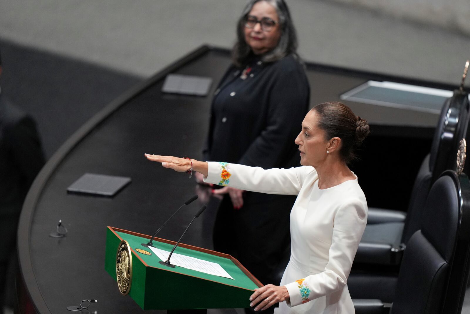 Claudia Sheinbaum takes the oath as Mexico's new president at Congress in Mexico City, Tuesday, Oct. 1, 2024. (AP Photo/Fernando Llano)