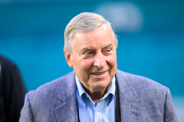 FILE - Buffalo Bills owner Terry Pegula smiles on the field before an NFL football game between the Buffalo Bills and the Miami Dolphins, Thursday, Sept. 12, 2024, in Miami Gardens, Fla. (AP Photo/Doug Murray, FIle)