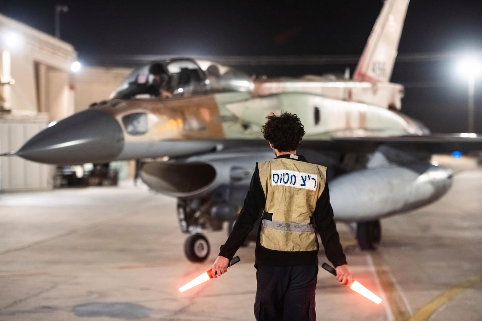 In this photo provided by the Israeli army, armed Israeli Air Force planes depart from an unknown location to attack Iran, Saturday, Oct. 26, 2024. (Israeli Army via AP)