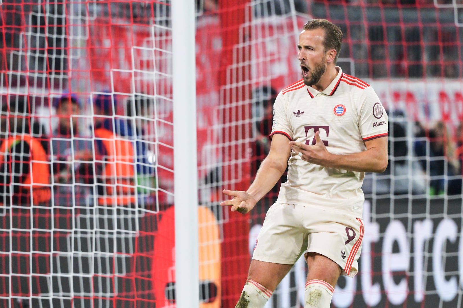 Munich's Harry Kane celebrates after scoring his side's sixth goal during a Champions League opening phase soccer match between FC Bayern Munich and Dinamo Zagreb in Munich, Tuesday, Sept. 17, 2024. (Peter Kneffel/dpa via AP)