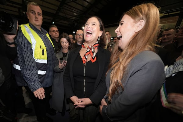 Sinn Féin President Mary Lou McDonald, center, celebrates after being elected on the third count at the election count centre at the RDS in Dublin, after the General Election, Saturday, Nov. 30, 2024. (Brian Lawless/PA via AP)