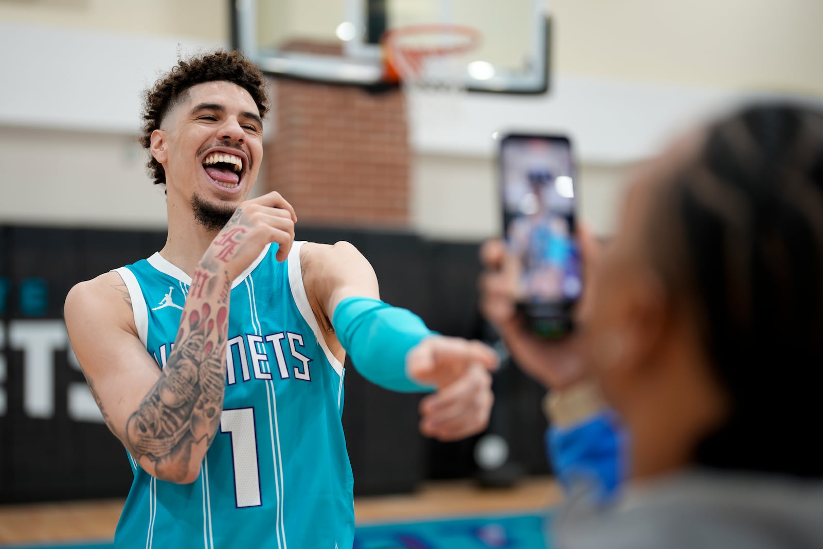 Charlotte Hornets' LaMelo Ball poses during the NBA basketball team's media day, Monday, Sept. 30, 2024, in Charlotte, N.C. (AP Photo/Chris Carlson)