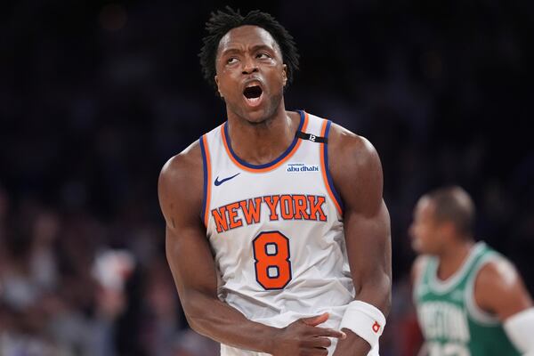 New York Knicks' OG Anunoby (8) celebrates after making a three-point shot during the second half of Game 6 in the Eastern Conference semifinals of the NBA basketball playoffs against the Boston Celtics Friday, May 16, 2025, in New York. (AP Photo/Frank Franklin II)