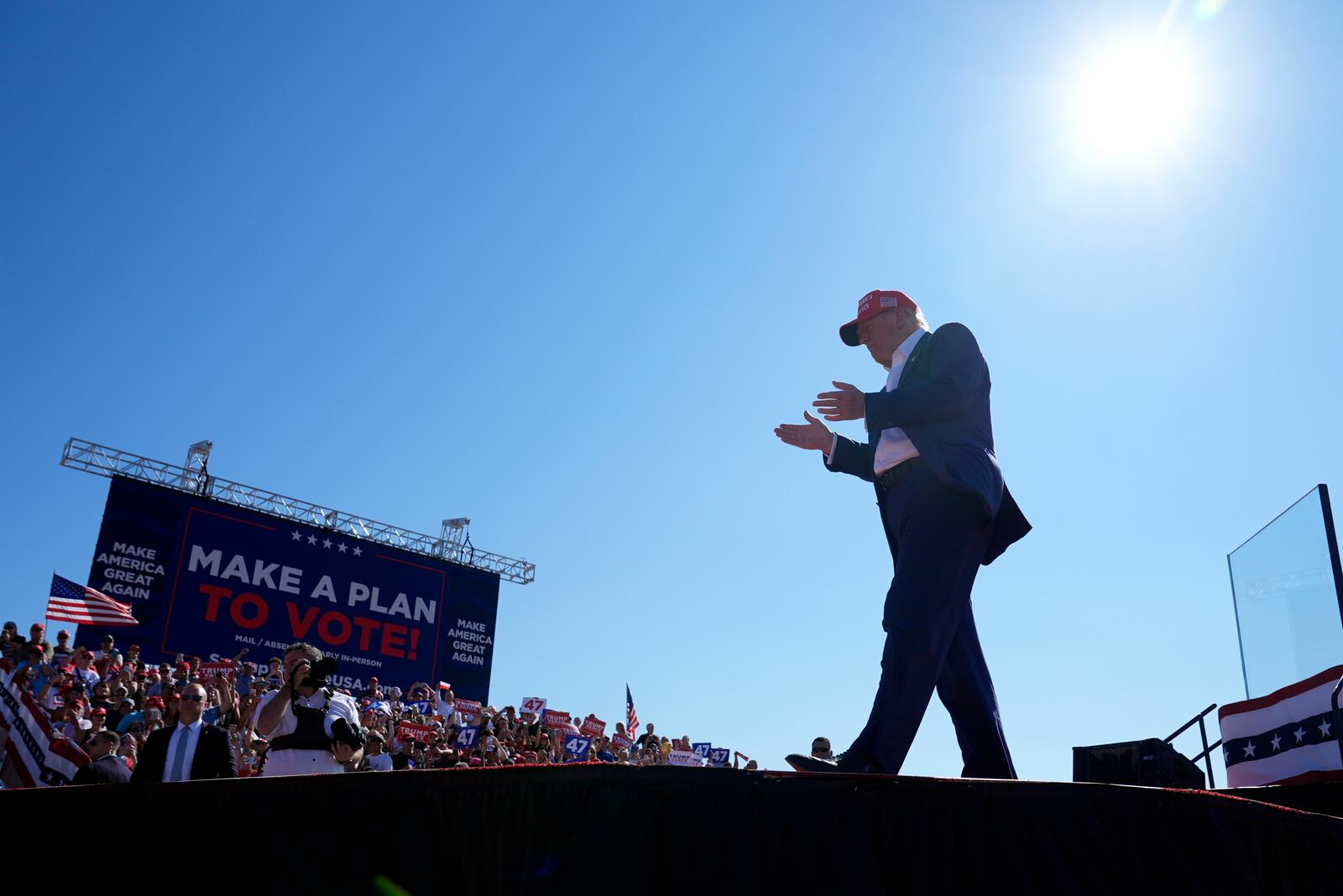 Republican presidential nominee former President Donald Trump walks from the podium after speaking at a campaign rally at Wilmington International Airport, Saturday, Sept. 21, 2024, in Wilmington, N.C. (AP Photo/Alex Brandon)