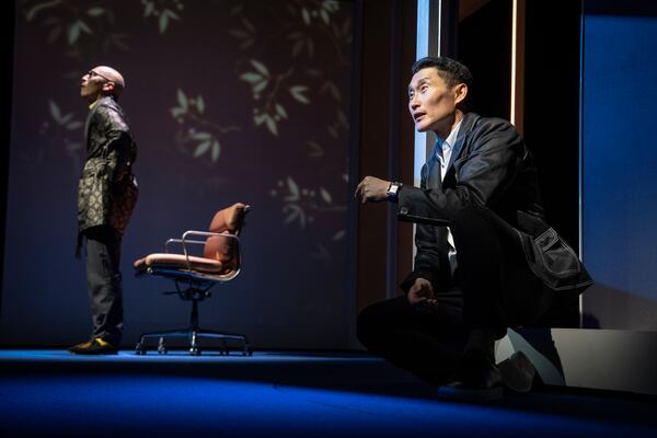 This image released by Polk & Co. shows Francis Jue, left, and Daniel Dae Kim during a performance of "Yellow Face on Broadway," a play by David Henry Hwang, in New York. (Joan Marcus/Polk & Co. via AP)
