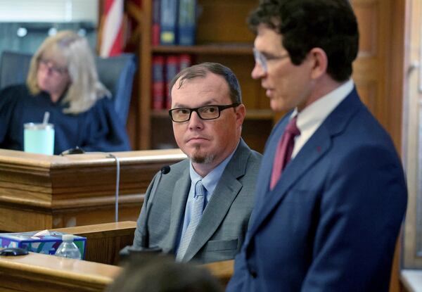 Digital forensics analyst Shanon Burgess looks up at defense attorney Robert Alessi during the Karen Read trial Tuesday, May 20, 2025, in Dedham, Mass. (Matt Stone/The Boston Herald via AP, Pool)