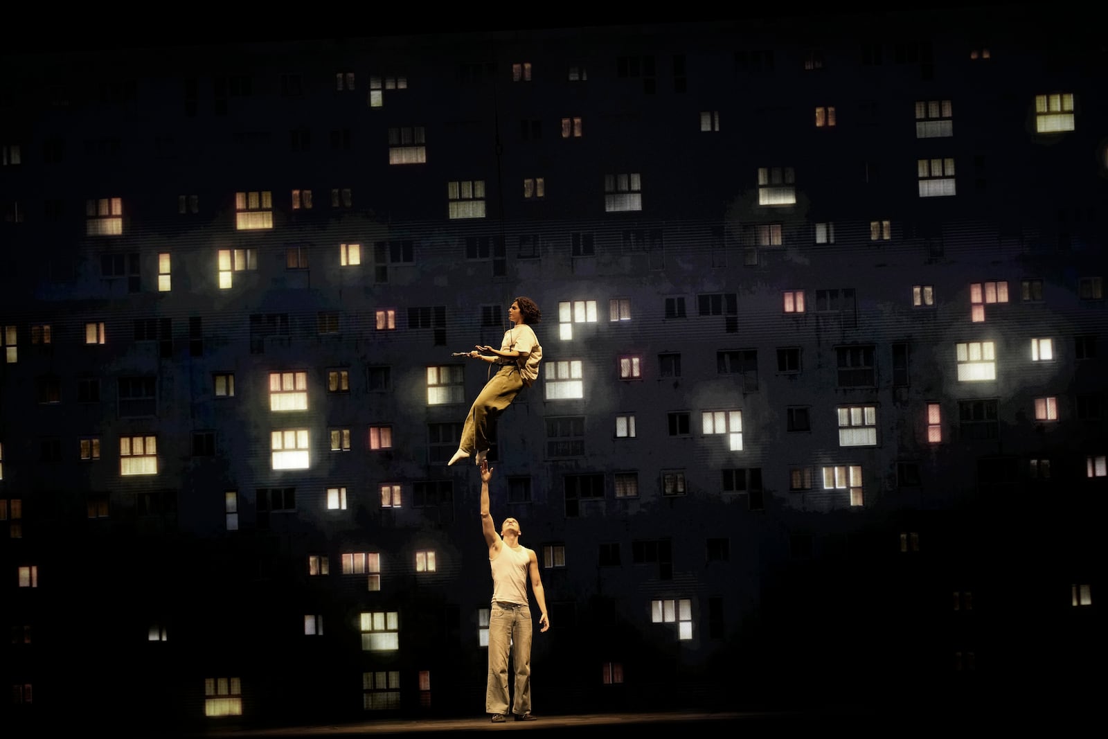 Actors perform during a rehearsal of La Haine musical show, in Tremblay en France, Tuesday, Sept. 17, 2024. (AP Photo/Christophe Ena)