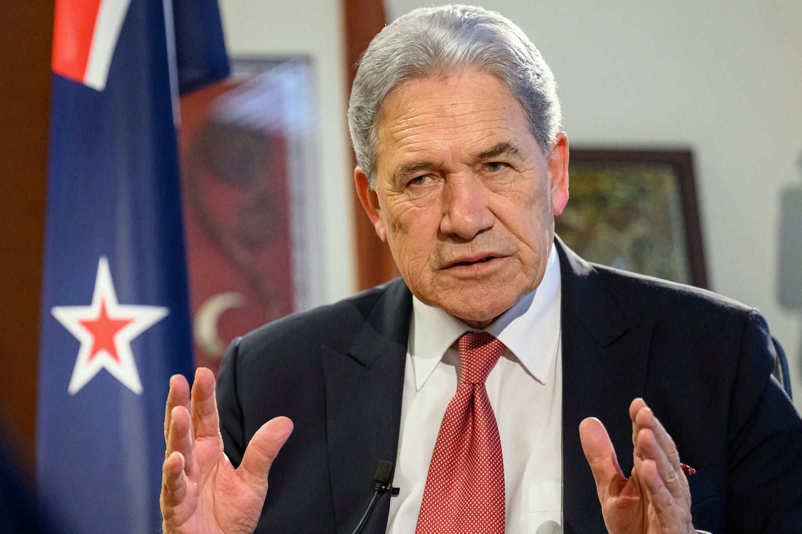 FILE - New Zealand Foreign Minister Winston Peters comments during an interview with The Associated Press in his parliamentary office in the capital, Wellington, Thursday, Aug. 22, 2024. (AP Photo/Mark Tantrum, File)