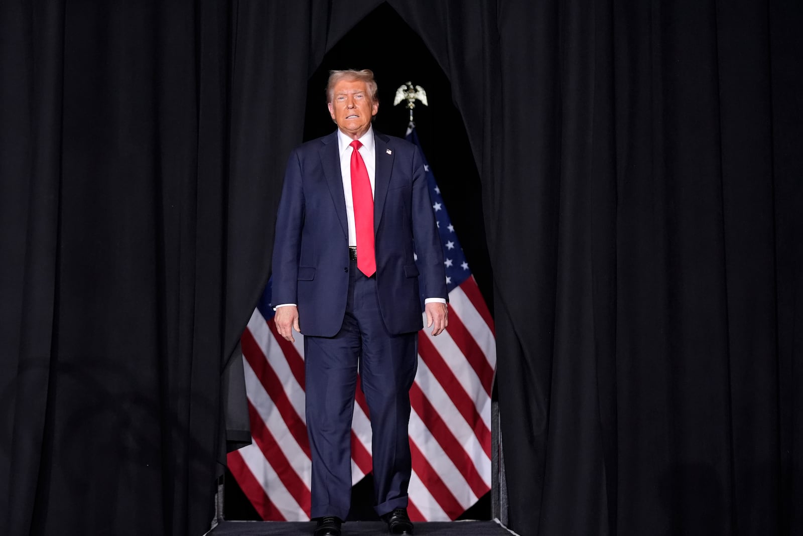 Republican presidential nominee former President Donald Trump arrives for a campaign rally at the Gaylord Rockies Resort & Convention Center, Friday, Oct. 11, 2024, in Aurora, Colo. (AP Photo/Alex Brandon)