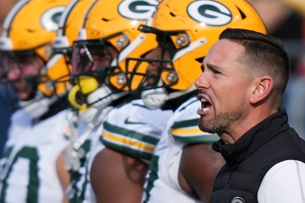 Green Bay Packers head coach Matt LaFleur argues a call during the first half of an NFL football game against the Chicago Bears Sunday, Nov. 17, 2024, in Chicago. (AP Photo/Charles Rex Arbogast)