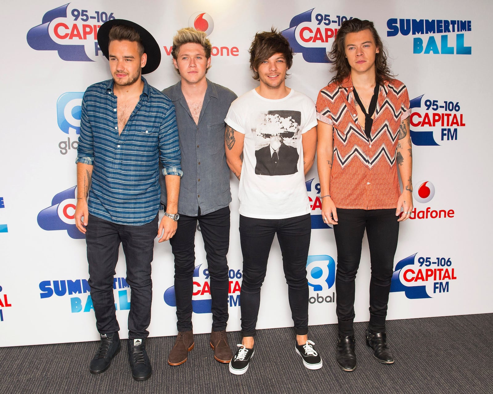 FILE - One Direction's Liam Payne, from left, Niall Horan, Louis Tomlinson and Harry Styles pose backstage at the Capital FM Summertime Ball held at Wembley Stadium, in London, on June 6, 2015. (Dominic Lipinski/PA via AP, File)