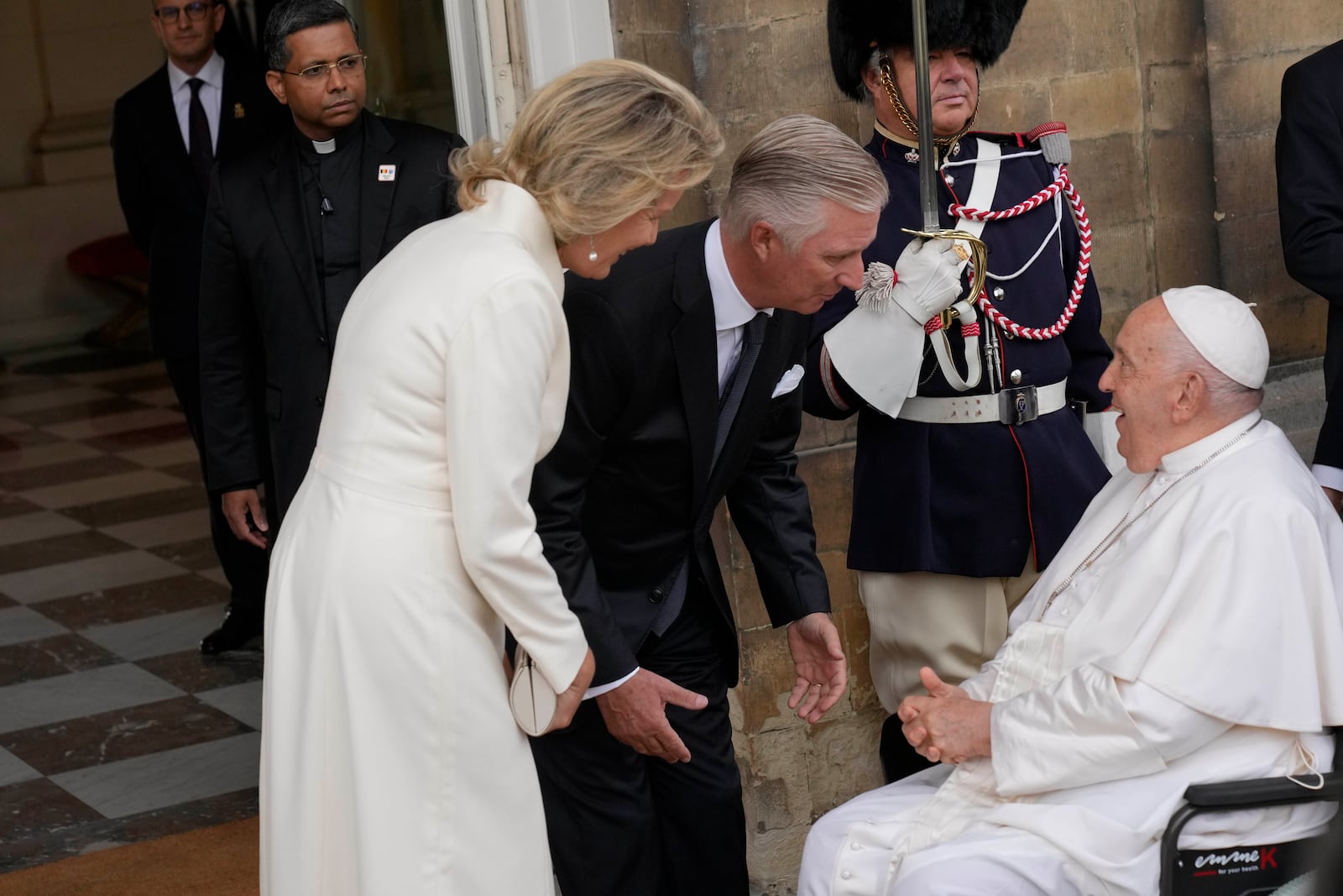 Pope Francis meets with King Philippe and Queen Mathilde in the Castle of Laeken, Brussels, Friday, Sept. 27, 2024. (AP Photo/Andrew Medichini)