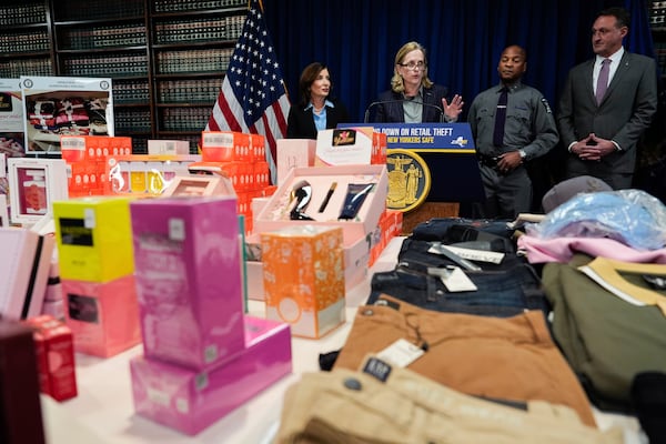 Queens District Attorney Melinda Katz speaks, as New York Gov. Kathy Hochul, New York State Police Superintendent Steven James and Homeland Security Investigations New York Special Agent in Charge William S. Walker looks on, at a press conference on an international stolen merchandise ring, Tuesday, Nov. 26, 2024, in the Queens borough of New York. (AP Photo/Julia Demaree Nikhinson)