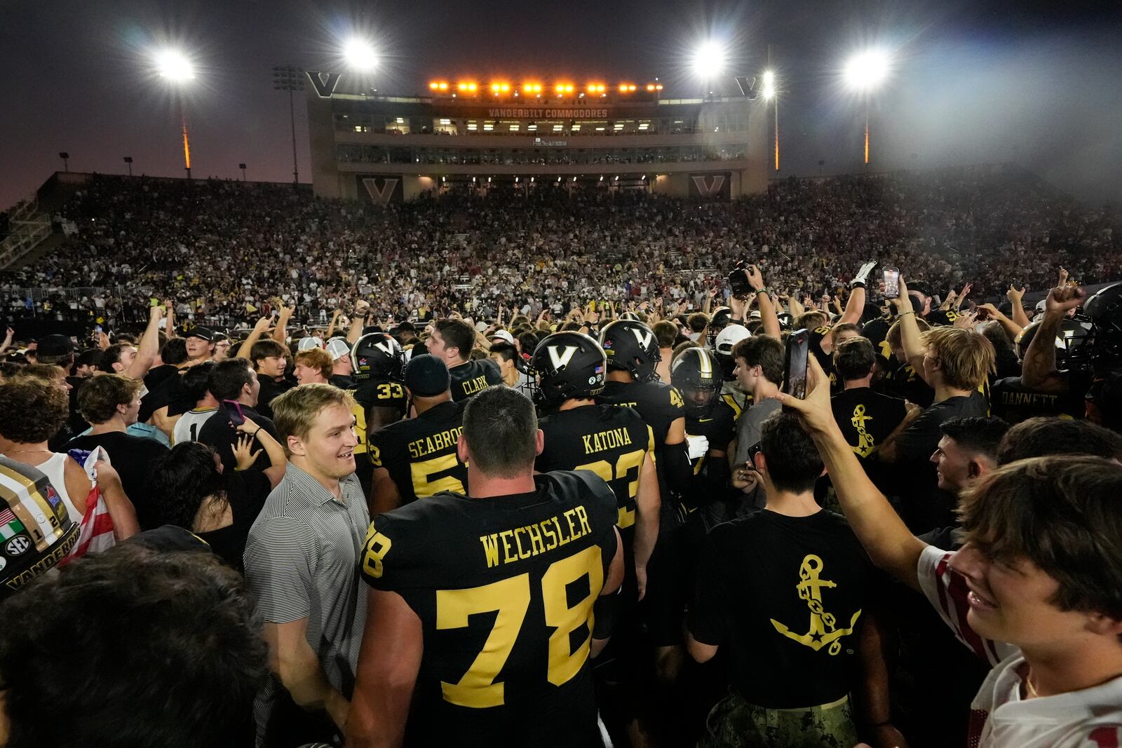 Vanderbilt celebrates the team's 40-35 win against Alabama on the field after an NCAA college football game Saturday, Oct. 5, 2024, in Nashville, Tenn. (AP Photo/George Walker IV)