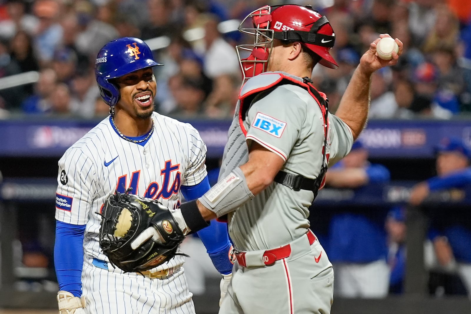 New York Mets' Francisco Lindor (12) reacts after striking out against the Philadelphia Phillies to end the fifth inning of Game 3 of the National League baseball playoff series, Tuesday, Oct. 8, 2024, in New York. (AP Photo/Seth Wenig)