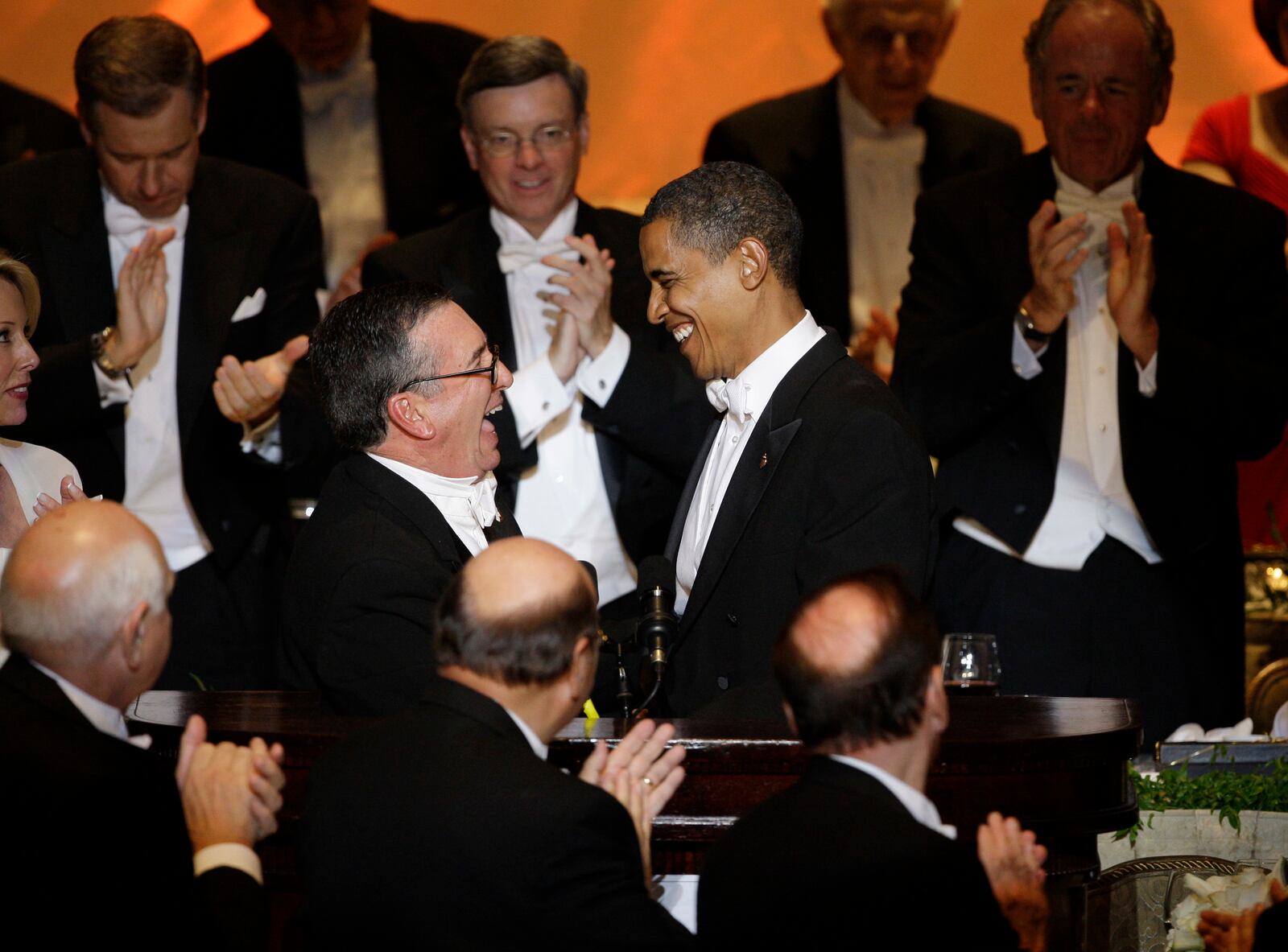 FILE - Democratic presidential candidate Sen. Barack Obama, D-Ill., shakes hands with Al Smith as he prepares to speak during the Alfred E. Smith Dinner at the Waldorf Astoria Hotel in New York on Oct. 16, 2008. (AP Photo/Carolyn Kaster, File)