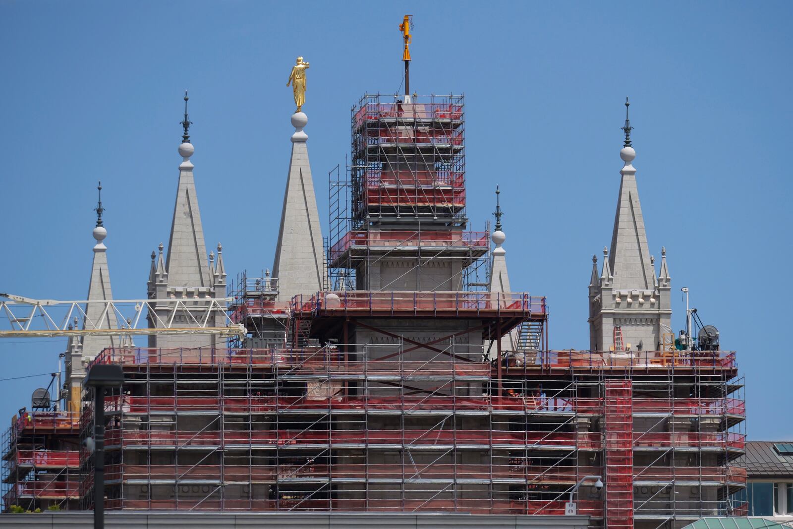 A view of the ongoing Temple Square renovation project, showing the Salt Lake Temple enveloped in scaffolding, is seen on June 17, 2024, in Salt Lake City. (AP Photo/Rick Bowmer)