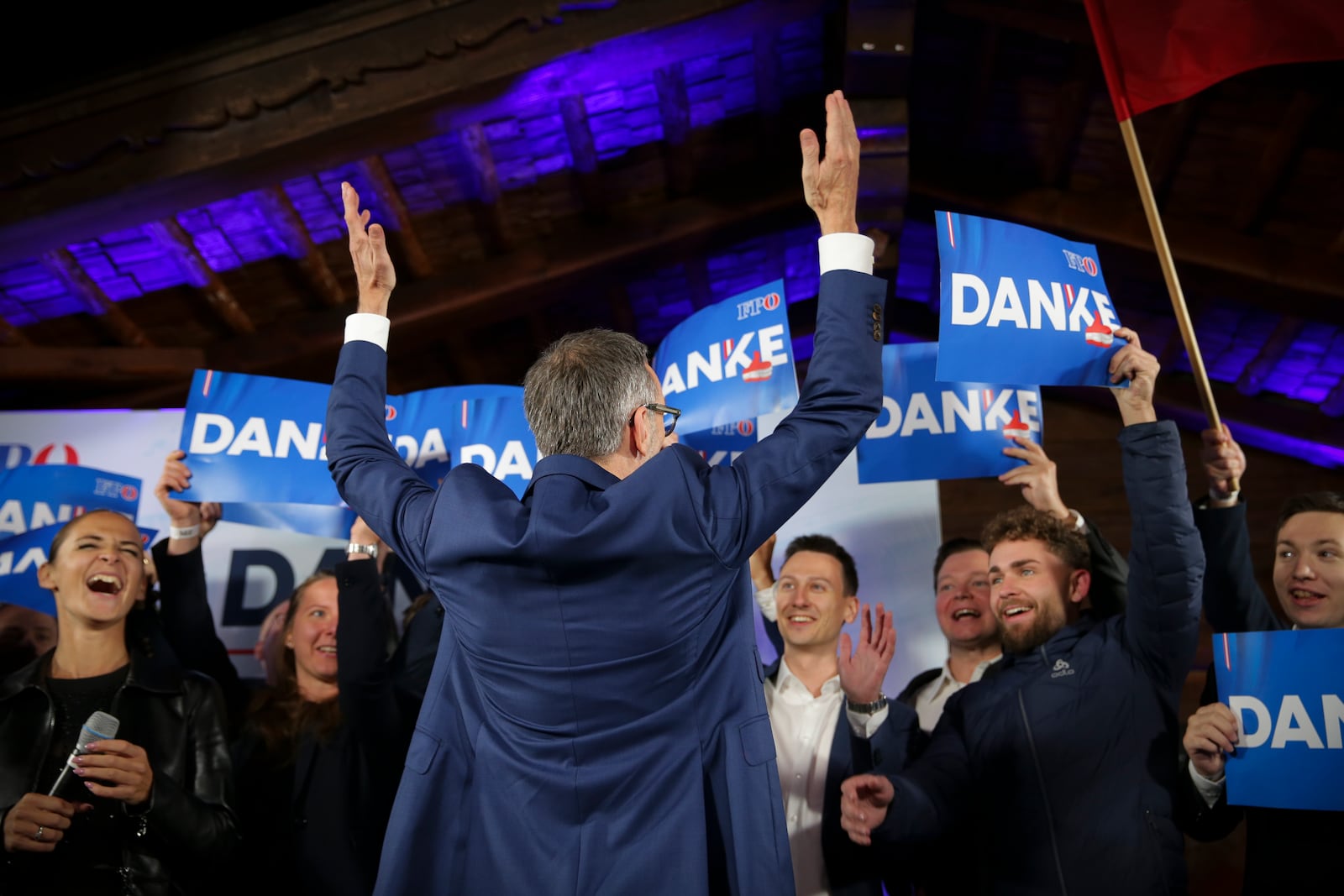 Herbert Kickl, leader of the Freedom Party of Austria cheers with supporters, in Vienna, Austria, Sunday, Sept. 29, 2024, after polls closed in the country's national election. (AP Photo/Heinz-Peter Bader)