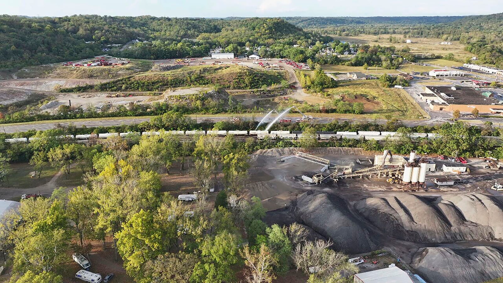 Firefighters work on the scene of a chemical leak in railcars near Cleves, Ohio, Tuesday, Sept. 24, 2024. (Local 12/WKRC via AP)