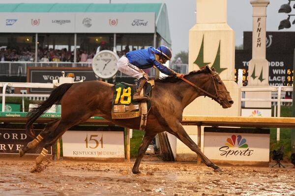 Sovereignty, ridden by Junior Alvarado, crosses the finish line to win the 151st running of the Kentucky Derby horse race at Churchill Downs Saturday, May 3, 2025, in Louisville, Ky. (AP Photo/Jeff Roberson)