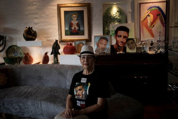 Varda Ben Baruch, whose grandson Edan Alexander is held hostage in the Gaza Strip by Hamas militants, poses for a portrait at home in Tel Aviv, Israel, Thursday, Nov. 14, 2024. (AP Photo/Maya Alleruzzo)