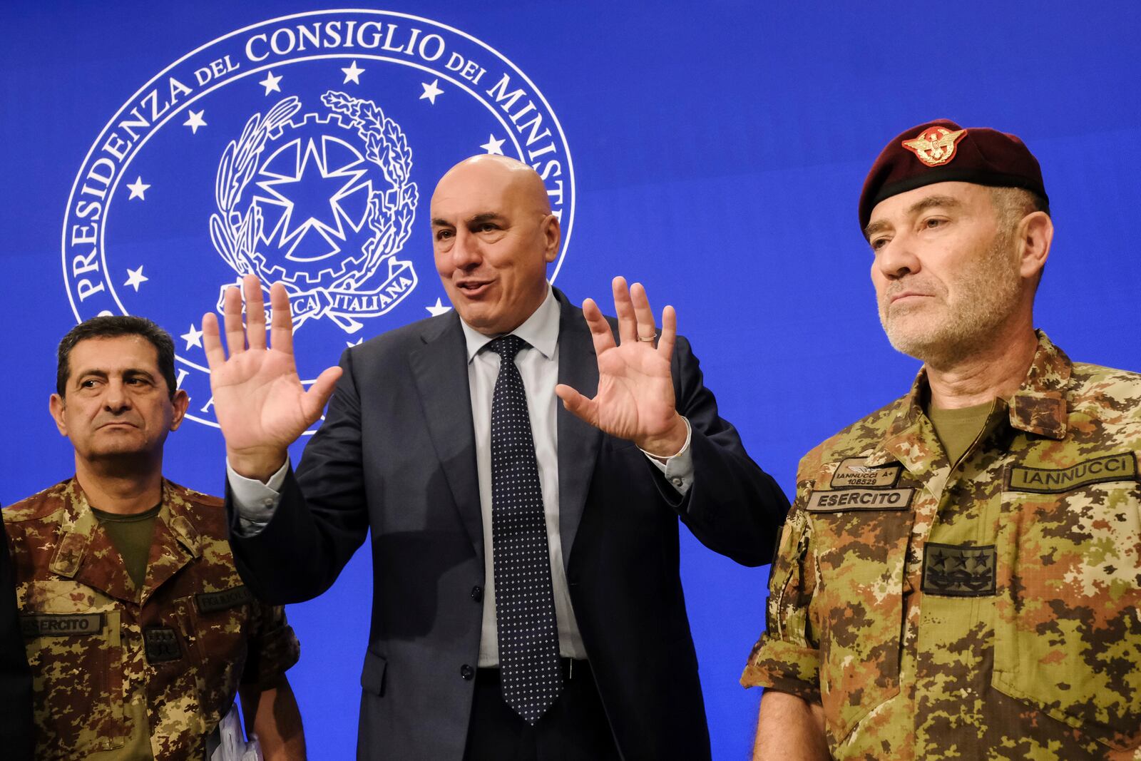 Italian Defense Minister Guido Crosetto, center, General Francesco Paolo Figliuolo, left, and General Giovanni Maria Iannucci meets the media during a press conference about the U.N. peacekeeping force in Lebanon, in Rome Thursday Oct. 10 2024. (Mauro Scrobogna/LaPresse via AP)