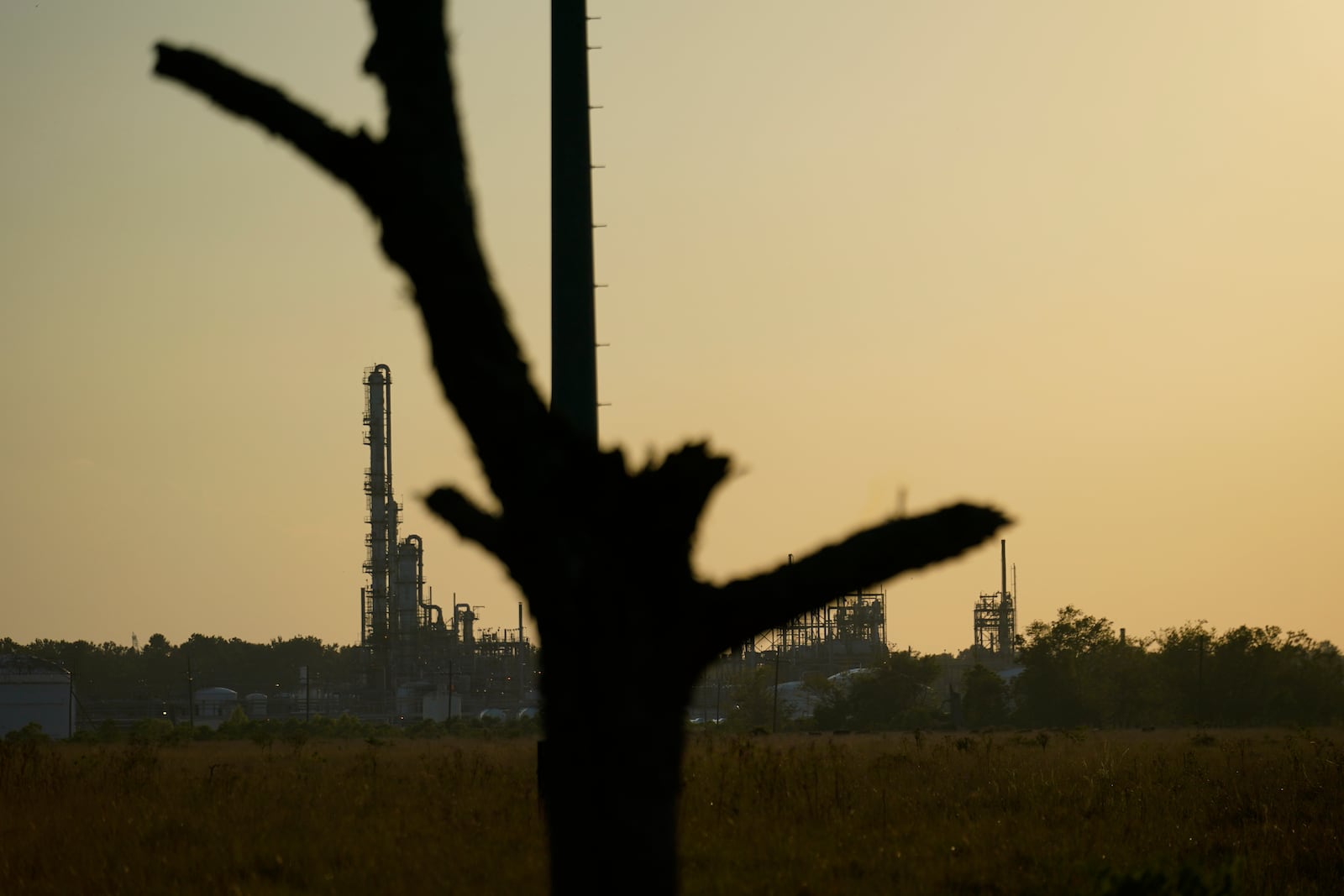 FILE - The Denka Performance Elastomer Plant sits at sunset in Reserve, La., Friday, Sept. 23, 2022. (AP Photo/Gerald Herbert)