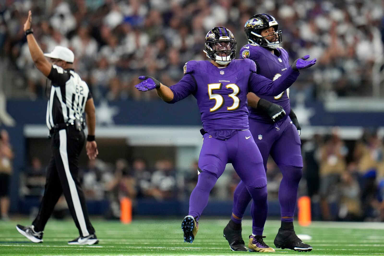 Baltimore Ravens linebacker Kyle Van Noy (53) celebrates after sacking Dallas Cowboys quarterback Dak Prescott in the second half of an NFL football game in Arlington, Texas, Sunday, Sept. 22, 2024. (AP Photo/Julio Cortez)