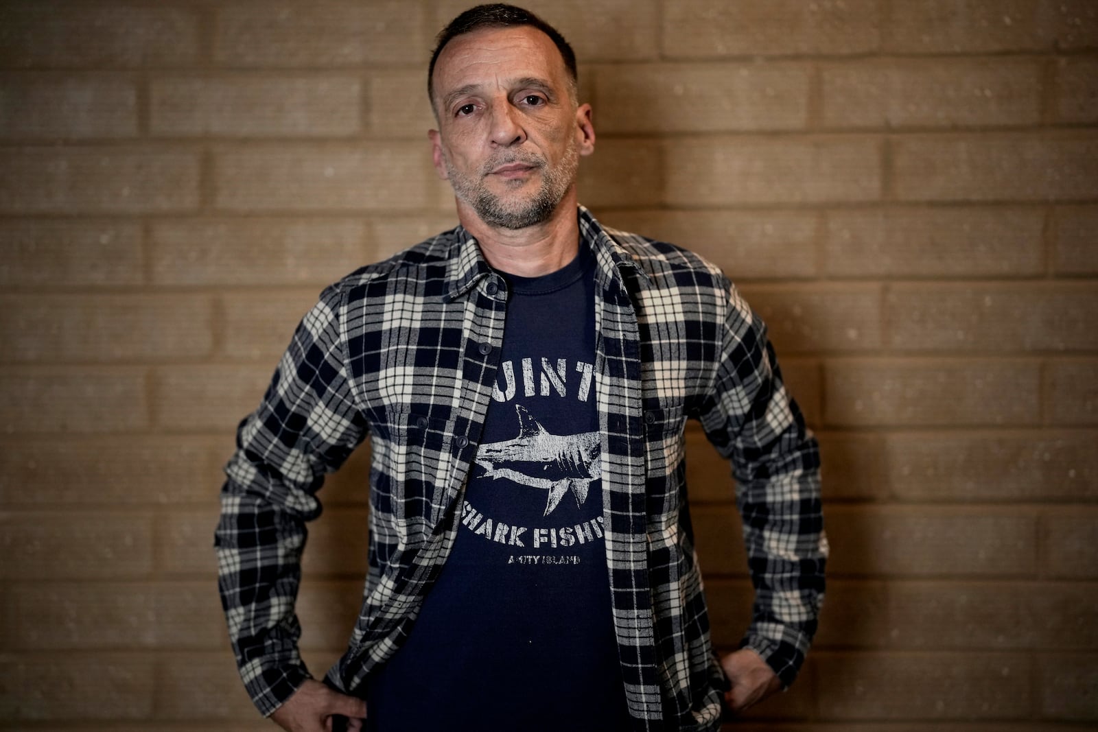 HOLD TO GO WITH ENT LA HAINE MUSICAL Kassovitz poses after an interview with Associated Press, in Tremblay-en-France, Tuesday, Sept. 17, 2024. (AP Photo/Christophe Ena)