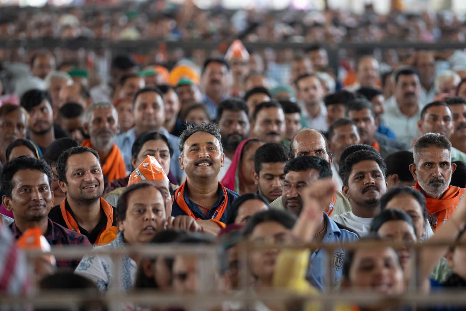 FILE- Bharatiya Janata Party (BJP) supporters listen as their Indian Prime Minister Narendra Modi speaks during a campaign rally of Jammu and Kashmir Assembly elections in Jammu, India, Saturday, Sept. 28, 2024. (AP Photo/Channi Anand, File)