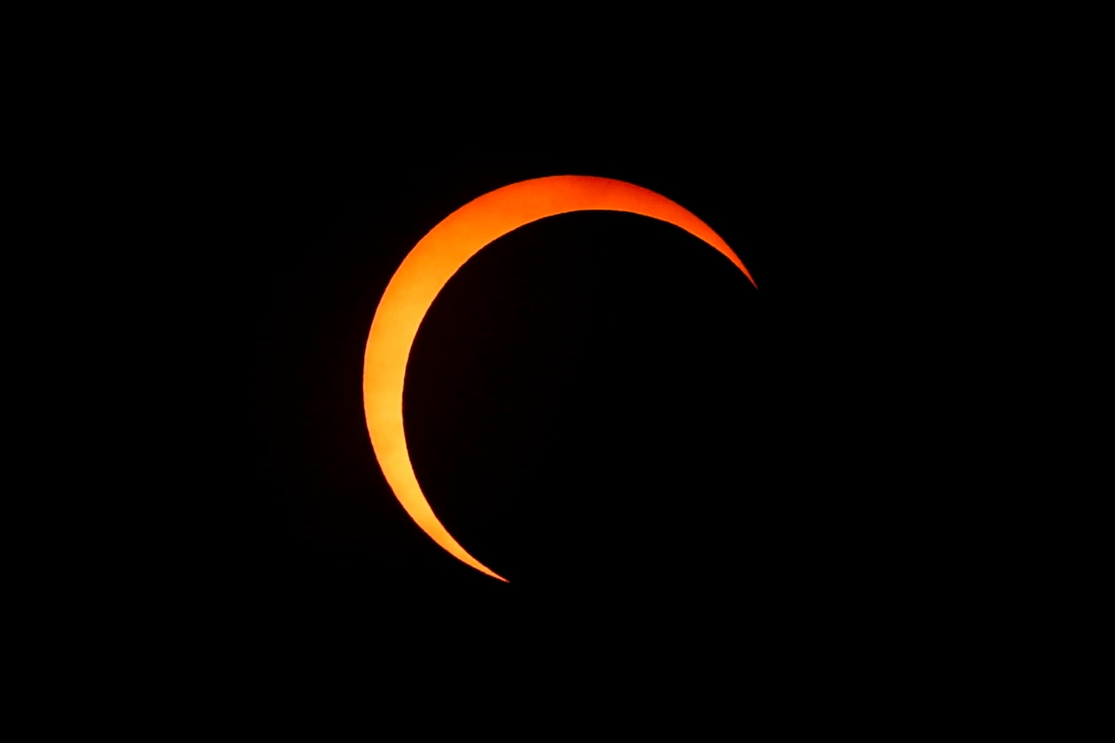 FILE - The annular solar eclipse above Boise, Idaho, reaches it's peak with the moon covering 80 percent of the sun, Saturday, Oct. 14, 2023. (Darin Oswald/Idaho Statesman via AP, File)