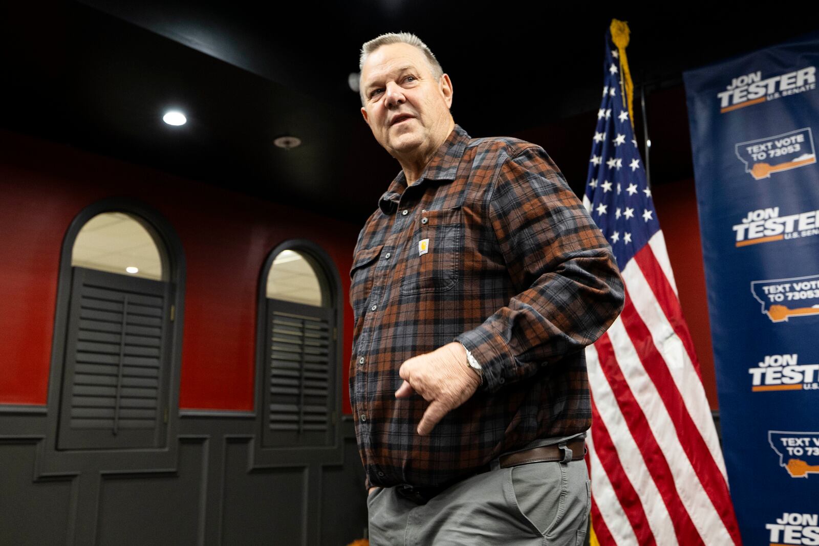 Democratic U.S. Sen. Jon Tester walks off stage after conceding the Montana Senate race to Republican Tim Sheehy in Great Falls, Mont. on Wednesday, Nov. 6, 2024. (Thom Bridge /Independent Record via AP)