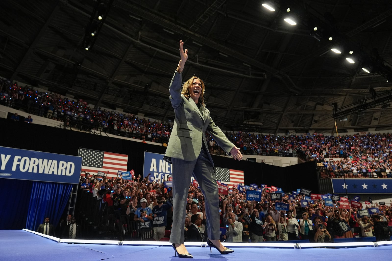 Democratic presidential nominee Vice President Kamala Harris waves to supporters during a rally, Friday, Sept. 20, 2024, in Madison, Wis. (AP Photo/Charlie Neibergall)