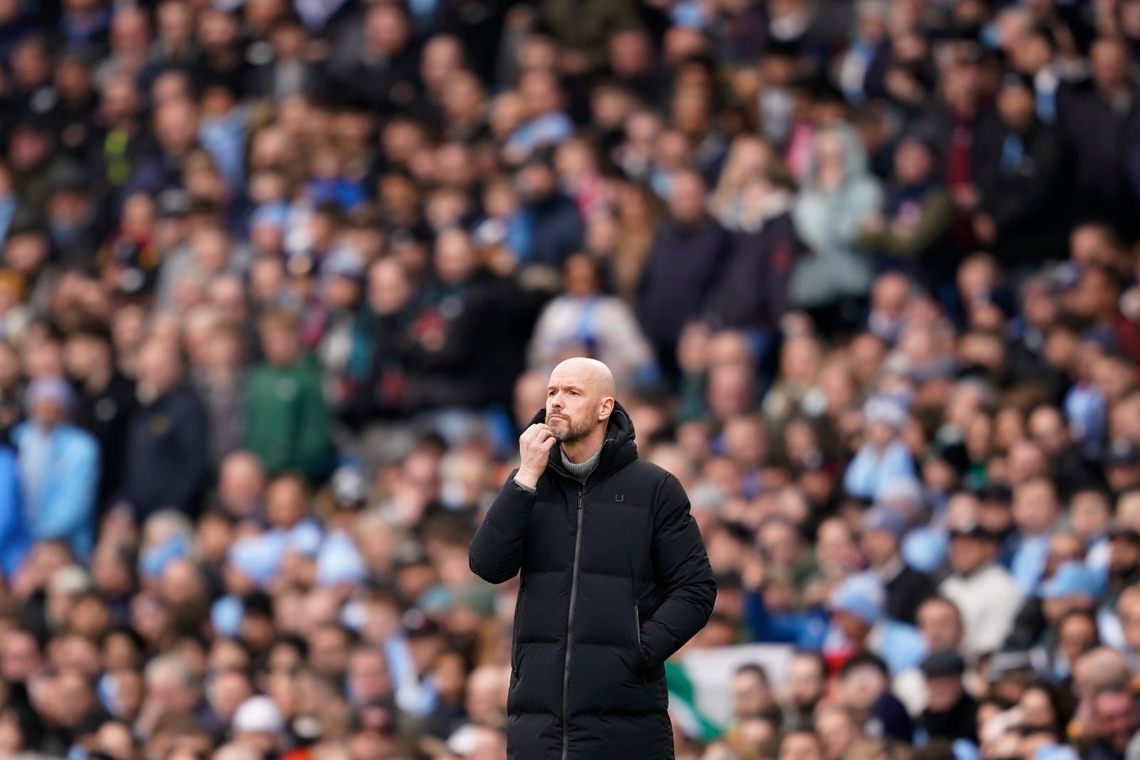 FILE - Manchester United's head coach Erik ten Hag watches the play during an English Premier League soccer match between Manchester City and Manchester United at the Etihad Stadium in Manchester, England, Sunday, March 3, 2024. (AP Photo/Dave Thompson, File)