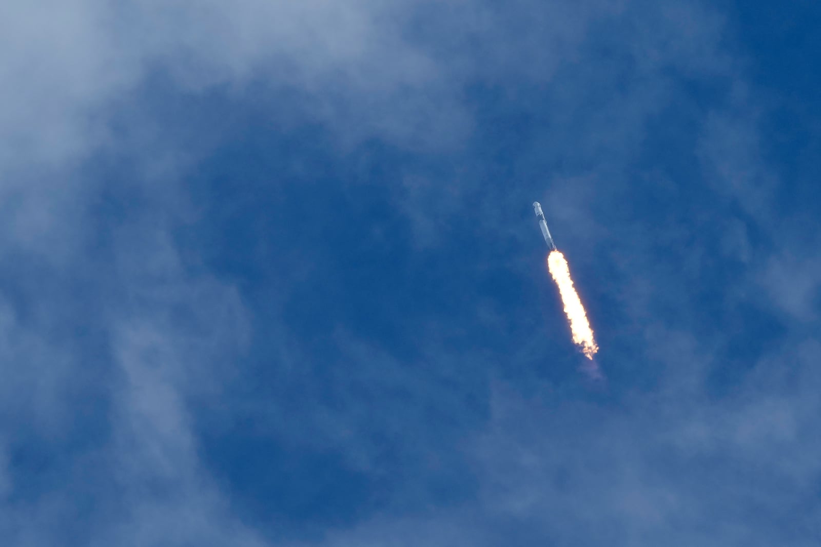 A SpaceX Falcon 9 rocket, with a crew of two astronauts, lifts off from launch pad 40 at the Cape Canaveral Space Force Station in Cape Canaveral, Fla., Saturday, Sept. 28, 2024. (AP Photo/Chris O'Meara)